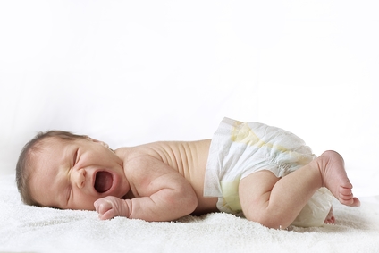 Yawning infant baby